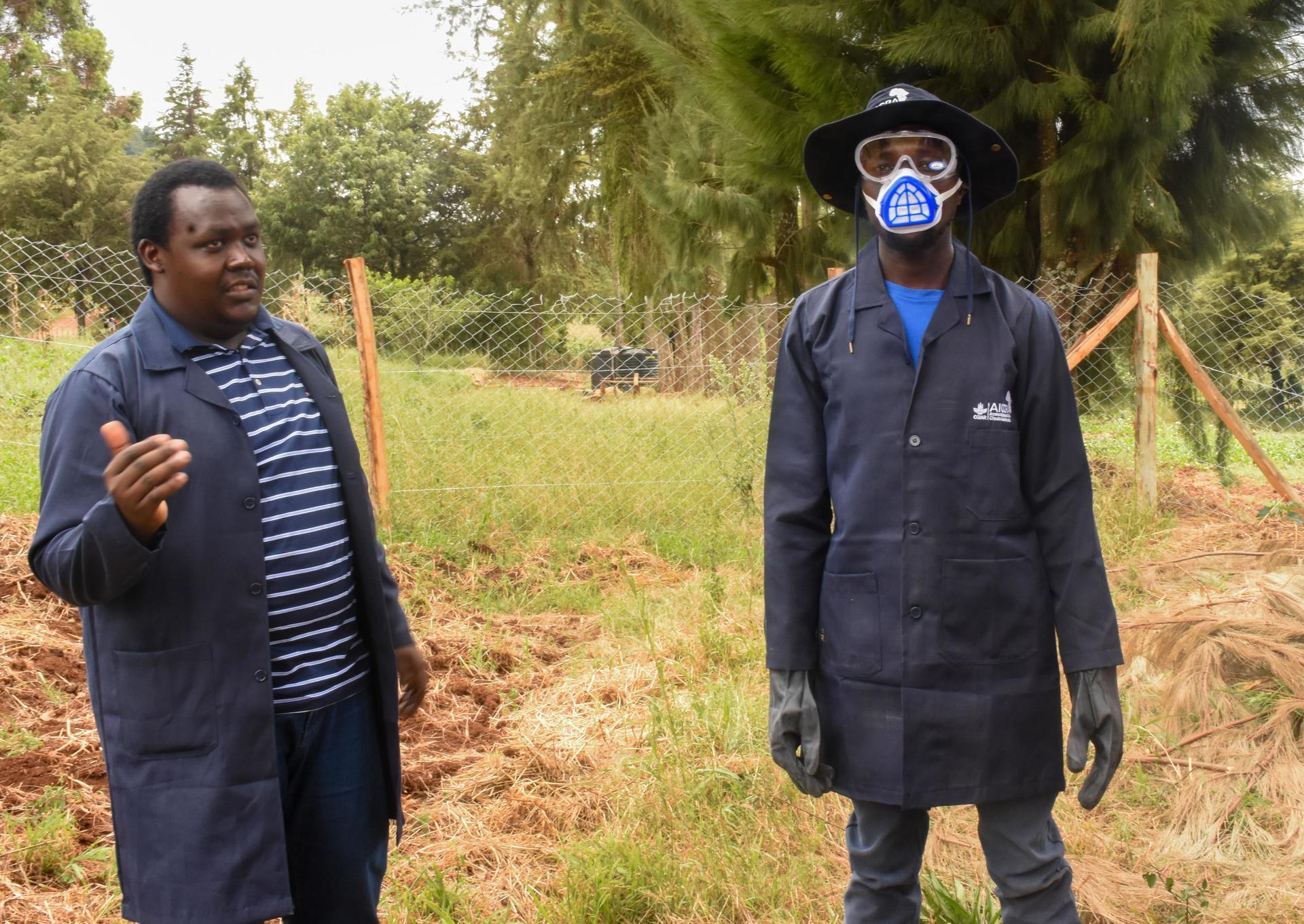 Engaging Small Scale Farmers in Environmental and Social Safeguards Sensitization - Farmer wearing PPE - Alliance Bioversity International - CIAT