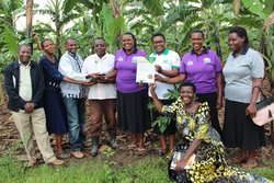 A team from Bioversity and NARO pose for a photo with Joy Mugisha. Credit: Bioversity International/J.Turyatemba