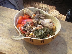 A split gourd bowl, or nzele, holds lunch for a visitor to Kyanika, Kenya. Credit: Bioversity International/C. Hoogendoorn (Coosje Hoogendoorn)