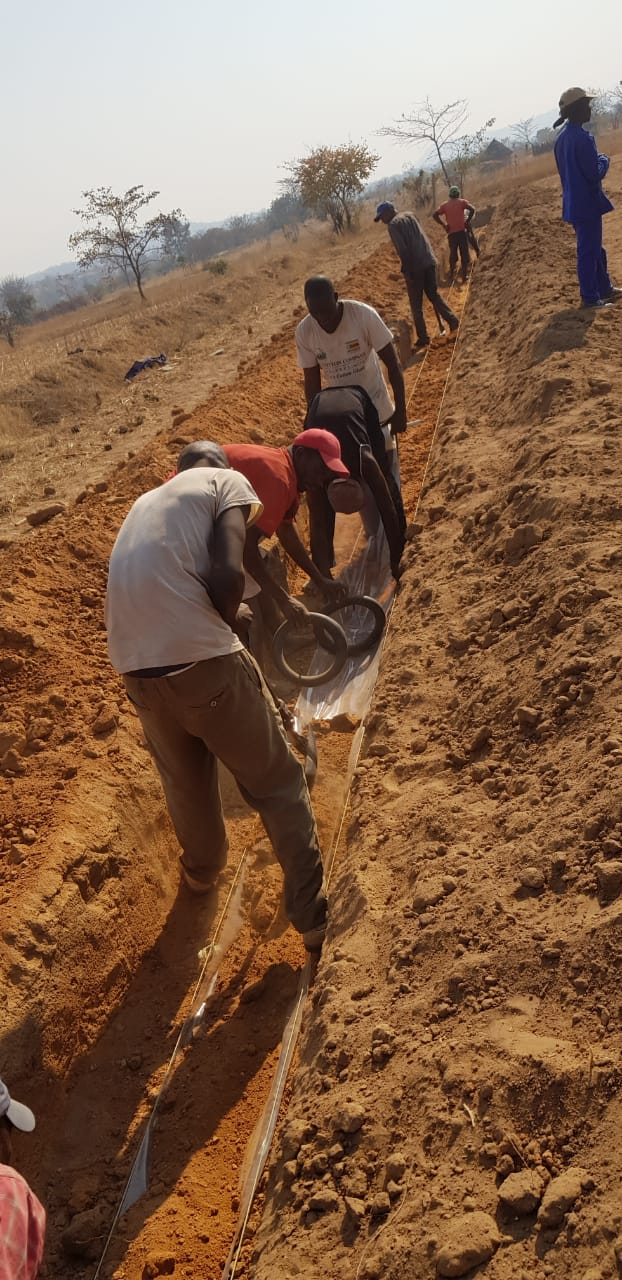 Farmers install SWRT membranes in Marange area of Zimbabwe as part of the technology's first trial in Africa in September 2019. Photo by:: Ngonidazshe Chirinda