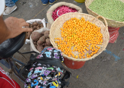 Uchuva, peas, potatoes, and tubers for sale in the street in Cali, Colombia. Photo by Melissa Reichwage/CIAT.