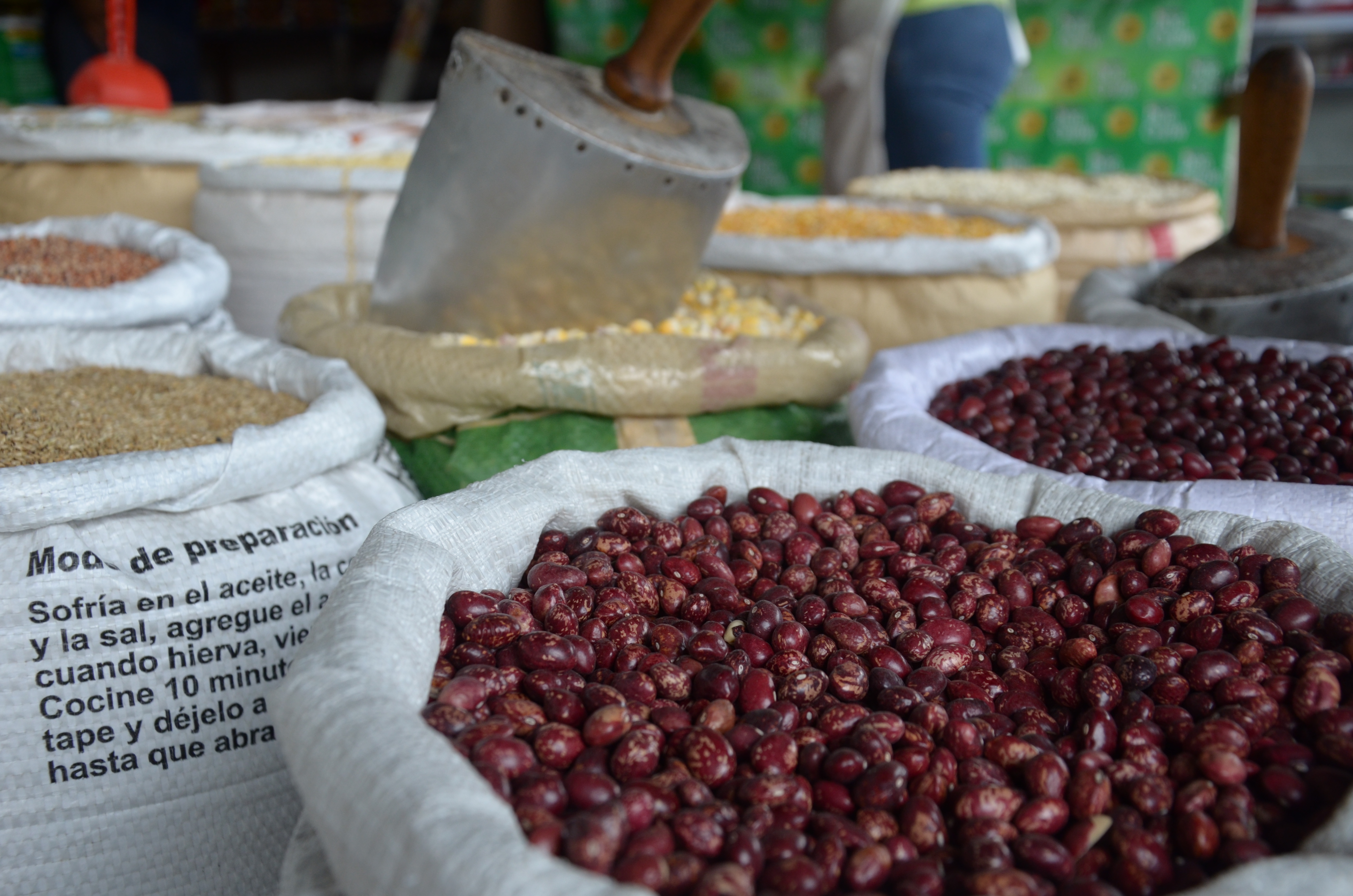 Beans - an important staple food in Colombia - and other products for sales in Alameda Market, Cali, Colombia. Photo by: Melissa Reichwage/CIAT.