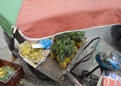 Pineapples for sale on a bicycle in Cali, Colombia. Photo by: Melissa Reichwage/CIAT.