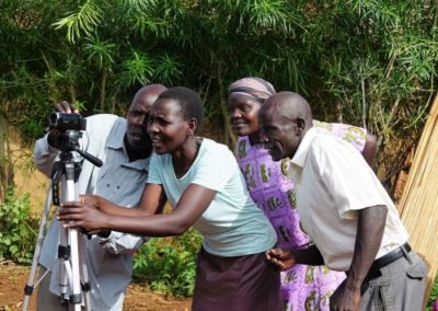 Farmers set up the camera for filming