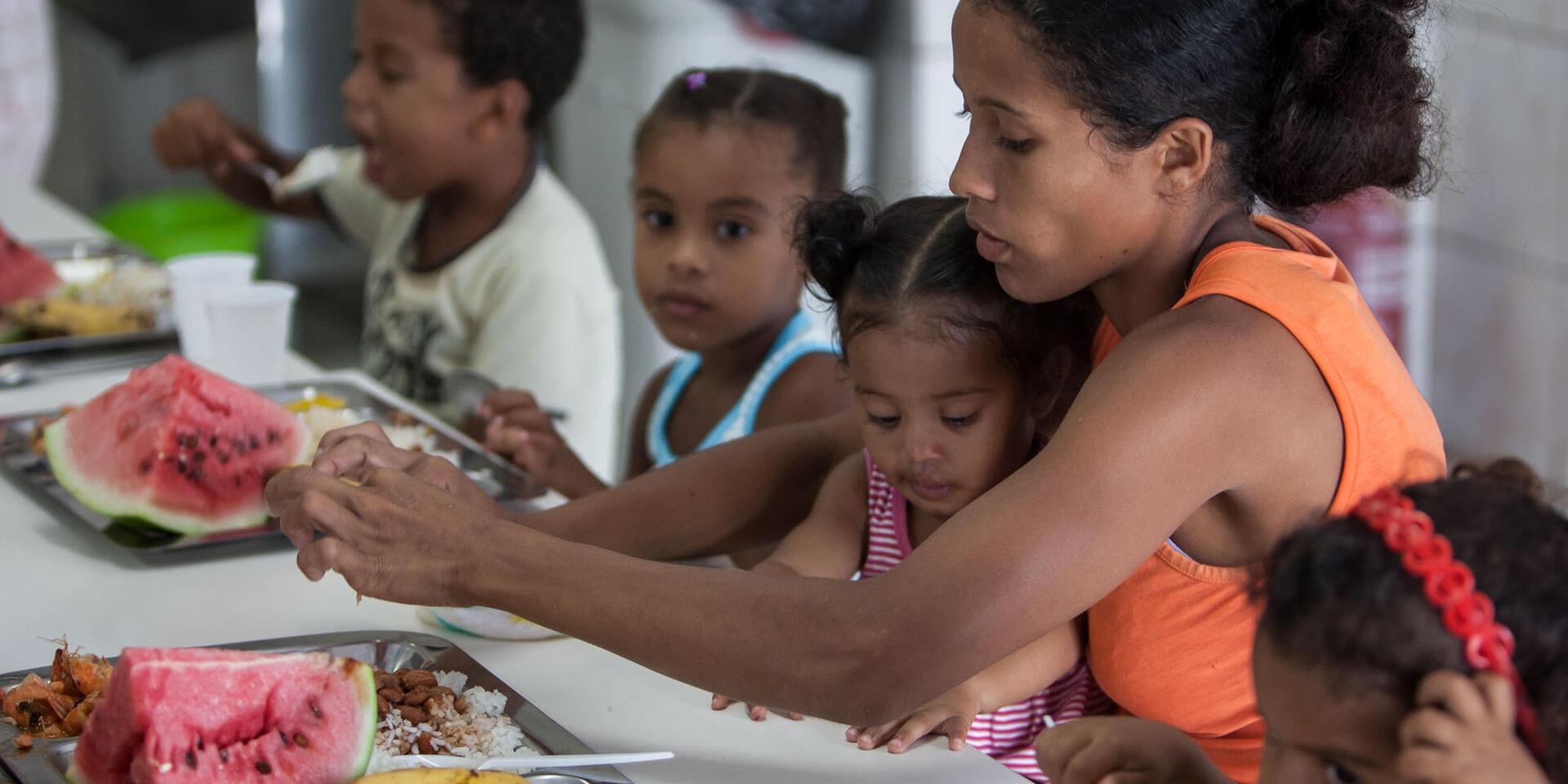 school children having school provided meal in a Latin American country