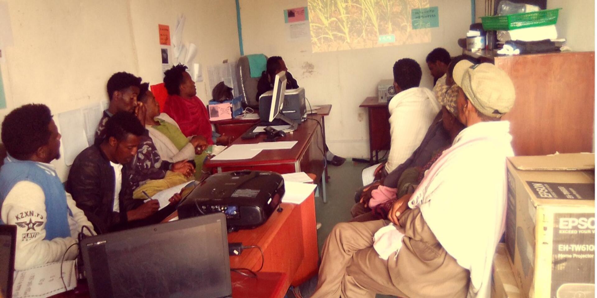 Figure 1. Meeting between youth, irrigation experts from the Bureau of Agriculture, and an expert from the Alliance of Bioversity and CIAT at the Debre Brehan Woreda Bureau of Agriculture